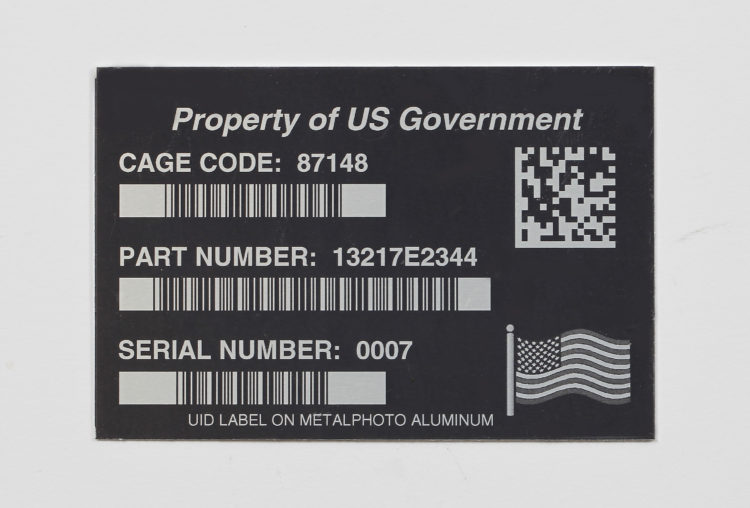 Photo of a Black Metal Asset Tag